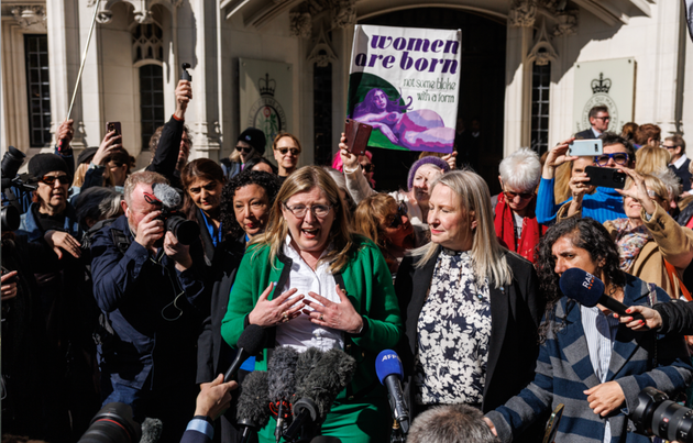 Sex-critical campaigners celebrating their win in the Supreme Court on Wednesday.