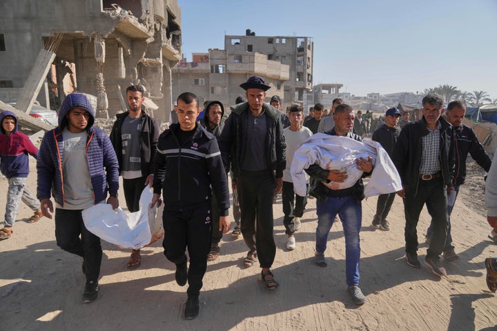 Palestinians carry the bodies of their relatives killed in an Israeli army airstrike, during their funeral in Khan Younis, southern Gaza Strip, Saturday, April 19, 2025. (AP Photo/Abdel Kareem Hana)