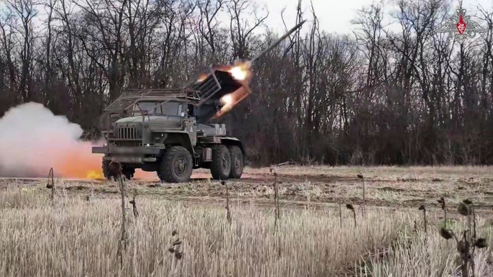In this photo taken from video distributed by Russian Defense Ministry Press Service on Friday, April 18, 2025, the Russian BM-21 "Grad" self-propelled 122 mm multiple rocket launcher fires towards Ukraine. (Russian Defense Ministry Press Service via AP)