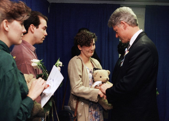 Aren Almon greets President Bill Clinton after a prayer service for the victims of the deadly truck bomb attack in Oklahoma City on April 23, 1995. (AP Photo/Pat Sullivan, File)