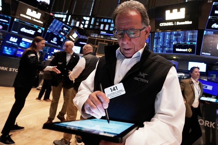 Trader Sal Suarino works on the floor of the New York Stock Exchange, Monday, April 21, 2025. (AP Photo/Richard Drew)