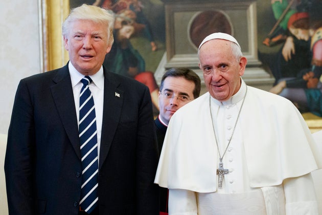 US President Donald Trump stands with Pope Francis during a meeting at the Vatican. President Joe Biden is scheduled to meet with Pope Francis on Friday, Oct. 29, 2021