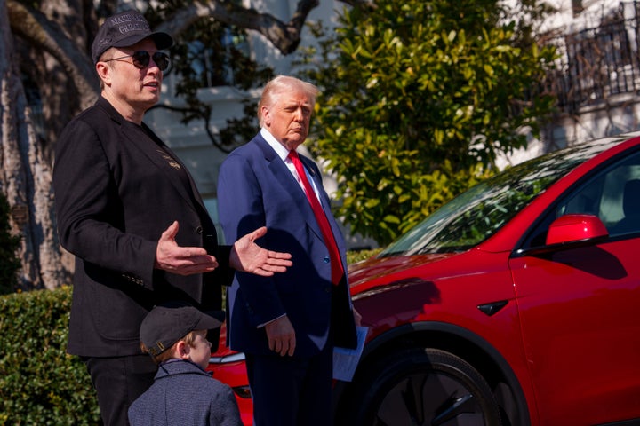 President Donald Trump helps peddle Elon Musk's Teslas at the White House in March.