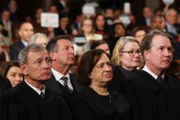 Supreme Court Chief Justice John Roberts and Justices Elena Kagan and Justice Brett Kavanaugh were three of the seven justices to join a late-night order temporarily blocking the removal of immigrants in a Texas detention center to El Salvador.