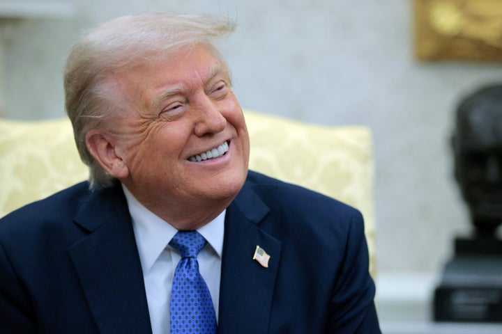 President Donald Trump smiles during an Oval Office meeting with Norway's Prime Minister Jonas Gahr Store on Thursday.