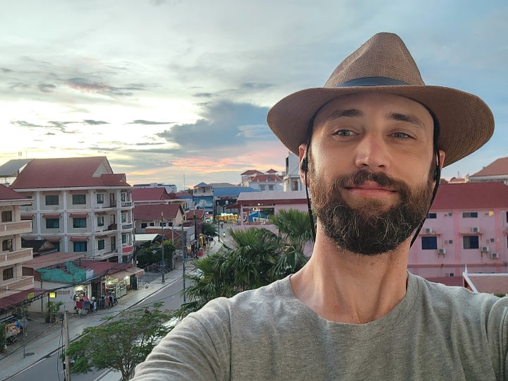 The author on his new apartment balcony in Cambodia.