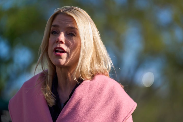Attorney General Pam Bondi speaks with reporters at the White House, Tuesday, April 8, 2025, in Washington.