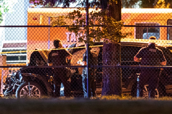 9 Killed As Car Plows Into Filipino Road Competition Crowd In Vancouver 1 Vancouver police examine a black car suspected to be involved at a scene after a vehicle drove into a crowd at the Lapu Lapu Festival in Vancouver, British Columbia, Saturday April 26, 2025. (Rich Lam/The Canadian Press via AP)