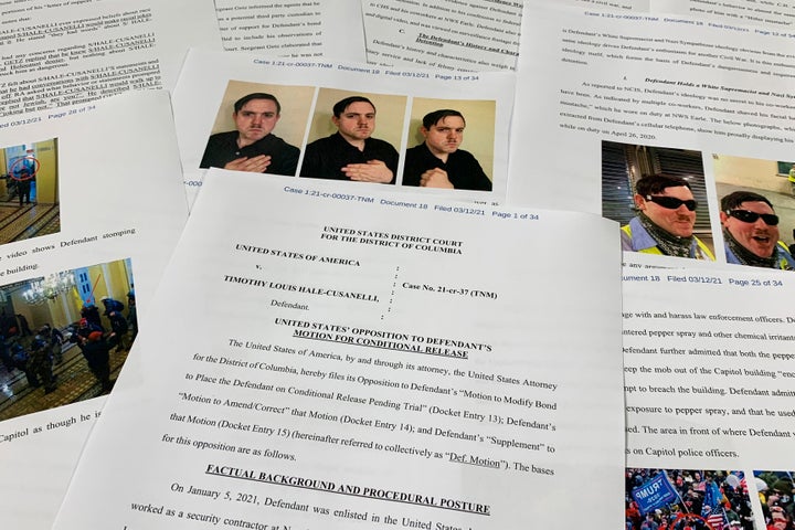 Pages from the Department of Justice motion to oppose the conditional release of Timothy Hale-Cusanelli ahead of his trial on charges stemming from the Jan. 6, 2021, riot at the U.S. Capitol, are photographed on May 24, 2022.