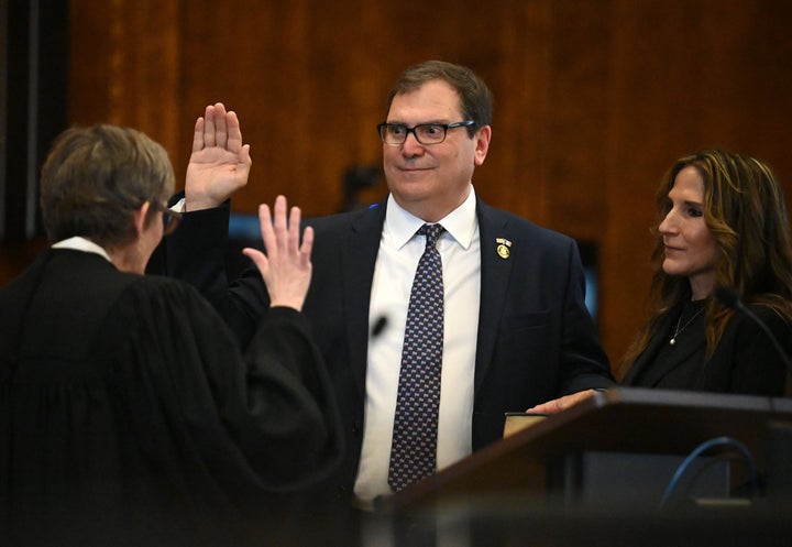 John A. Sarcone III, center, is sworn in as U.S. attorney for the Northern District of New York by Judge Brenda K. Sannes, left, during a ceremony on March 17 at the James T. Foley U.S. Courthouse in Albany, New York.