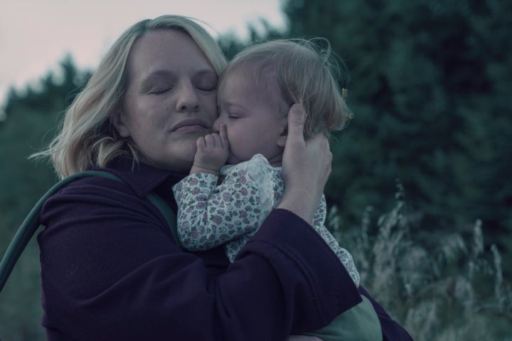 June tries to settle in a new community with her daughter in "The Handmaid's Tale."