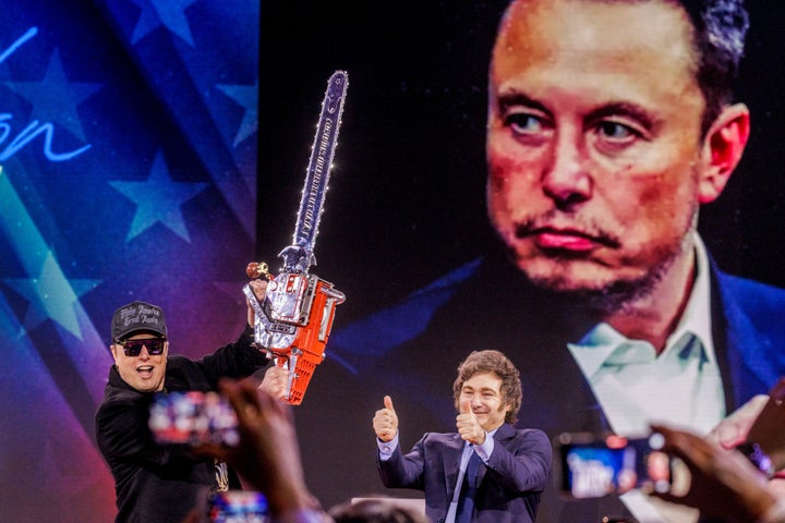 Here is Elon Musk maniacally waving a chainsaw in front of a giant image of his face during the annual Conservative Political Action Conference in February. All totally normal.