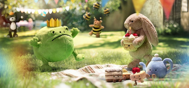 Jellycat toys staged on a lawn