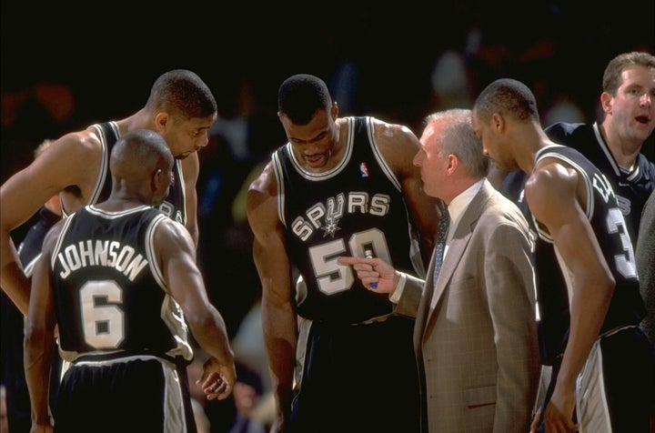 San Antonio Spurs coach Gregg Popovich with David Robinson (50), Tim Duncan (21), and Avery Johnson (6) on sidelines during game vs Los Angeles Lakers, Inglewood, CA 5/22/1999 (Photo by John W. McDonough/Sports Illustrated via Getty Images)