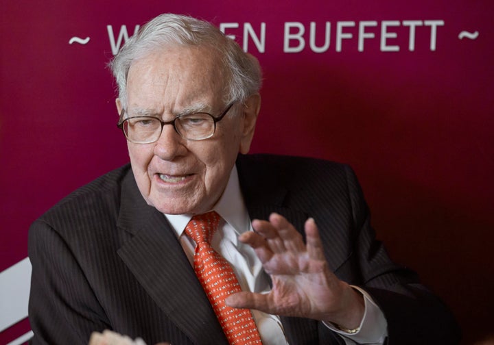 Warren Buffett, Chairman and CEO of Berkshire Hathaway, speaks during a game of bridge after the annual Berkshire Hathaway shareholders meeting in Omaha, Neb., May 5, 2019.