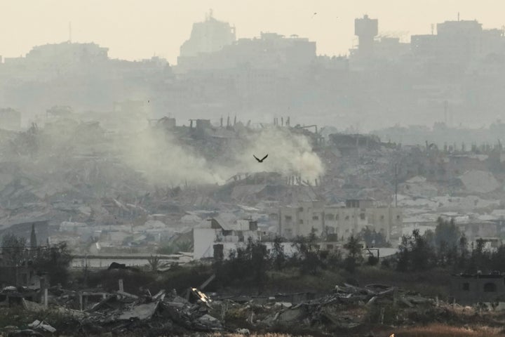 Buildings that were destroyed during the Israeli ground and air operations in the Gaza Strip are seen from southern Israel on Sunday, May 4, 2025. (AP Photo/Ariel Schalit)