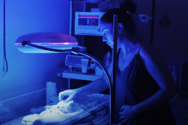 A mother, Yulia, with her newborn in the Kherson City Perinatal Center in Ukraine