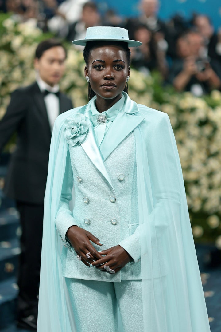 Lupita Nyong'o stunned in Chanel during the 2025 Met Gala on Monday, May 5. Her glittery brows were quite the touch.