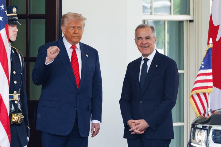 US President Donald Trump, left, greets Mark Carney, Canada's prime minister, during an arrival ceremony outside the West Wing of the White House in Washington, DC, US, on Tuesday, May 6, 2025. The in-person meeting carries high stakes for Carney, who led his Liberal Party to a stunning victory by promising to win the trade war with the US and protect Canadian sovereignty in the face of US aggression. Photographer: Aaron Schwartz/Bloomberg via Getty Images