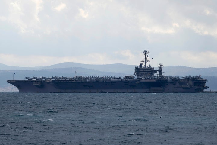 FILE - Aircraft carrier USS Harry S. Truman is moored near Split, Croatia, Feb. 14, 2022.