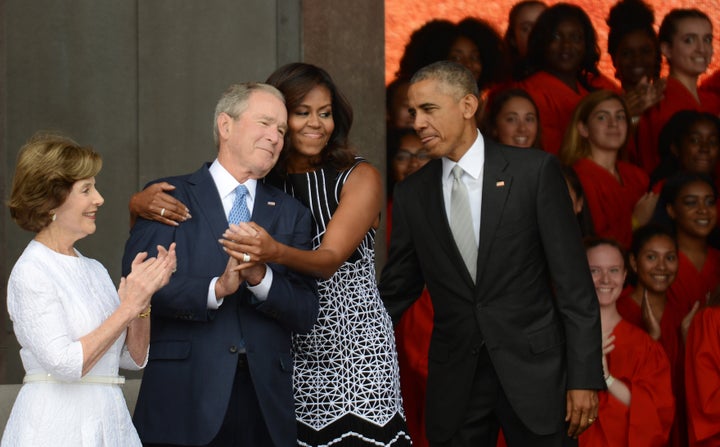 Melania Trump Could Look Like A Chump Thanks To A Snub By 1 Key Republican 2 Michelle Obama hugs George W. Bush as their respective spouses, Barack Obama and Laura Bush, look on during the dedication of the National Museum of African American History and Culture in 2016.