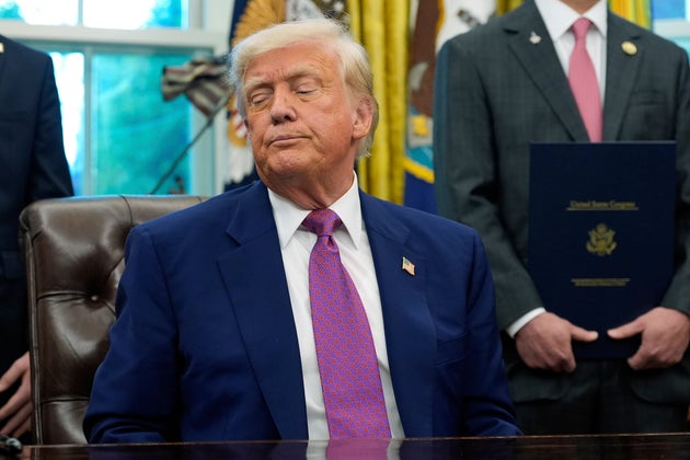 President Donald Trump waits to sign an executive order in the Oval Office of the White House, Friday, May 9, 2025, in Washington.