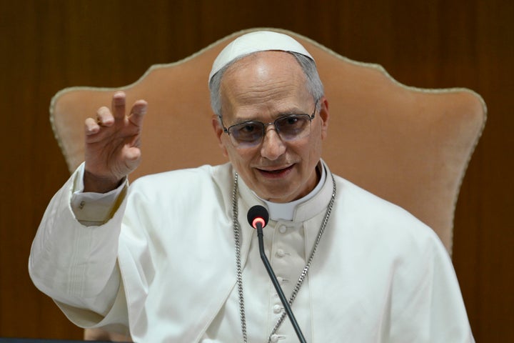 VATICAN CITY, VATICAN - MAY 10: Pope Leo XIV (formerly Robert Francis Prevost) makes his first address to the College of Cardinals on May 10, 2025 in Vatican City, Vatican. In his remarks, he referred to the inspiration for his papal name, saying that Pope Leo XIII addressed issues of human dignity and social justice "in the context of the first great industrial revolution" and that today "the Church offers to all her treasure of social teaching in response to another industrial revolution and the developments of artificial intelligence." (Photo by Vatican Media/Vatican Pool - Corbis/Getty Images)