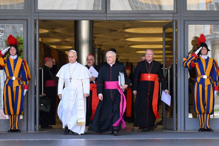 Pope Leo XIV Lays Out Imaginative and prescient Of Papacy And Identifies AI As A Important Problem For Humanity 1 Pope Leo XIV, left, is flanked by Monsignor Leonardo Sapienza, second from left, after his meeting with the College of Cardinals in the New Synod Hall at the Vatican, Saturday, May 10, 2025. (Vatican Media via AP)