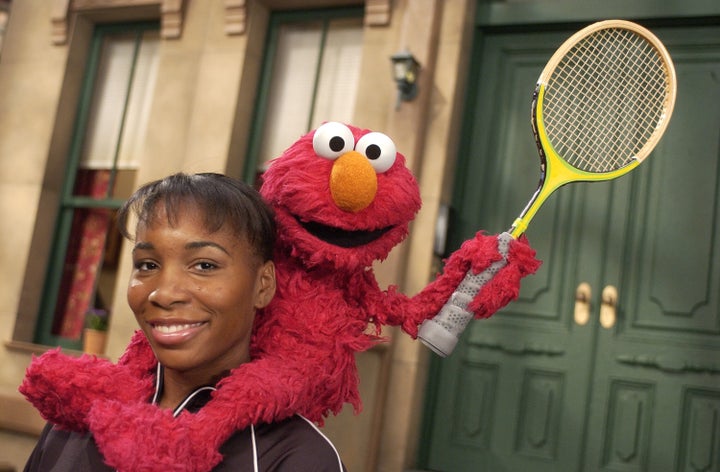 Venus Williams and Elmo at Sesame Street- Kaufman Studios in New York City, New York, United States. (Photo by Theo Wargo/WireImage for Sesame Workshop)