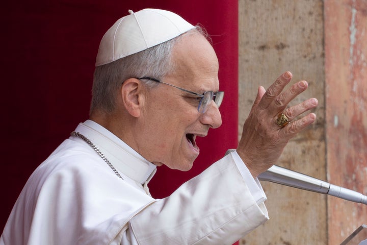 Pope Leo XIV speaks from the central balcony of St. Peter's Basilica, where he delivered his first Sunday blessing to the faithful gathered in St. Peter's Square, on May 11.