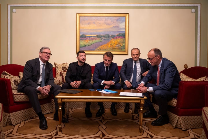 From left, British Prime Minister Keir Starmer, Ukrainian President Volodymyr Zelenskyy, French President Emmanuel Macron, Polish Prime Minister Donald Tusk and German Chancellor Friedrich Merz make a call to U.S. President Donald Trump from Kyiv, Ukraine, on May 10, 2025.