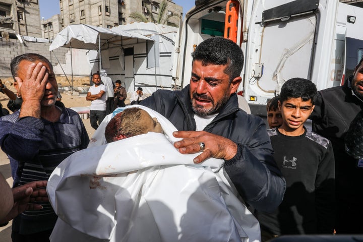 (EDITORS NOTE: Image depicts death) Relatives mourn after an Israeli strike targeted the city of Khan Younis in southern Gaza, on May 11, 2025. The attack resulted in multiple casualties, many of whom were taken to Nasser Hospital.