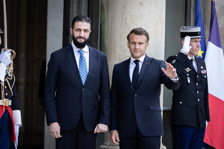 French President Emmanuel Macron (right) welcomes Syria's Interim President Ahmed al-Sharaa (left), at the Elysee Presidential Palace in Paris. This was the first visit of Ahmed al-Sharaa to a European country as leader of the transitional government, following the fall of the Assad regime in December.