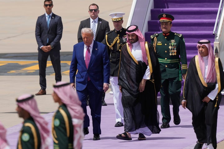 President Donald Trump walks with Saudi Crown Prince Mohammed bin Salman during an arrival ceremony at the Royal Terminal of King Khalid International Airport in Riyadh, Saudi Arabia, on May 13, 2025.