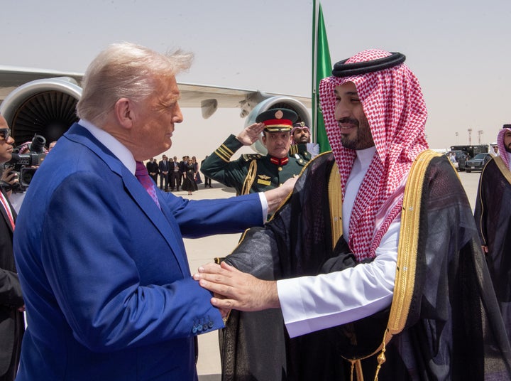 President Donald Trump (L) is welcomed by Saudi Crown Prince Mohammed bin Salman Al Saud (R) as he arrives at Malik Khalid Airport, for the first leg of his three-country Middle East tour in Riyadh, Saudi Arabia, on May 13, 2025.