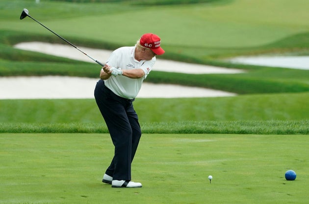 Donald Trump plays golf 