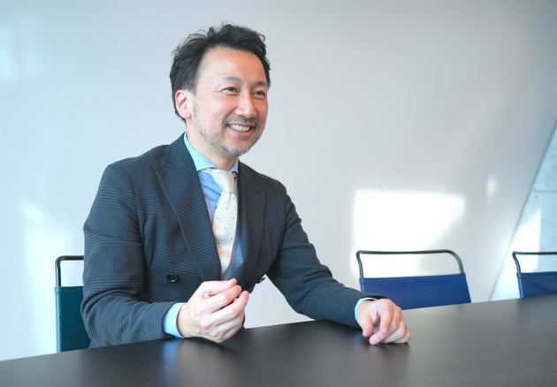 取材に応じる久下幸典さん