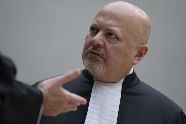 Chief Prosecutor Karim Khan talks prior to the first appearance of former Philippine President Rodrigo Duterte before the International Criminal Court (ICC) on charges of crimes against humanity over his deadly crackdown on narcotics, in The Hague, on March 14, 2025. U.S. President Donald Trump's sanctions on Khan and the ICC have effectively halted the tribunal's work.