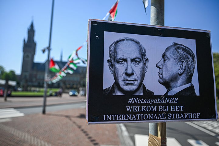 A sign featuring a mock mugshot of Israeli Prime Minister Benjamin Netanyahu is displayed near the International Court of Justice in The Hague, Netherlands, on May 2, 2025. U.S. President Donald Trump's sanctions three months ago on the International Criminal Court's chief prosecutor Karim Khan have effectively halted the tribunal's work, after the court issued arrest warrants for Netanyahu and former Israeli Defense Minister Yoav Gallant.