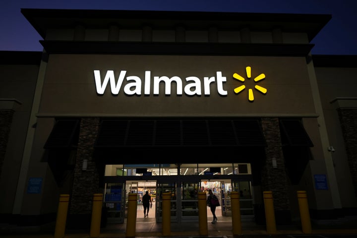 Shoppers enter a Walmart store in La Habra, Calif., Wednesday, April 9, 2025. (AP Photo/Jae C. Hong)