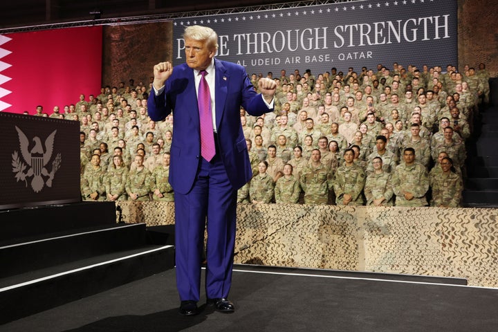 President Trump dances on stage as he tour the Al Udeid Air Base in Doha, Qatar, on May 15.
