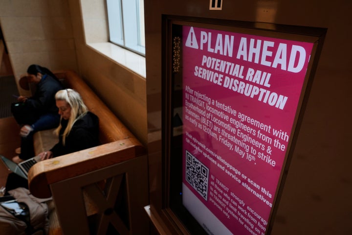 An electronic display advises commuters of potential NJ Transit service disruptions at the Secaucus Junction station in Secaucus, N.J., on May 14, 2025.
