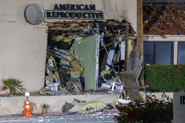 PALM SPRINGS, CALIFORNIA - MAY 17: The damaged front of the American Reproductive Centers fertility clinic stands following a bomb blast on May 17, 2025 in Palm Springs, California. A suspected bomber is believed to have post a manifesto to social media before the explosion. One person was confirmed dead at the scene, according to police. (Photo by David McNew/Getty Images)