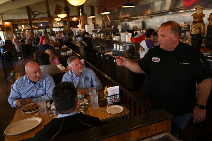 BJ's Nevada Barbecue serves as a beacon of growth in the Sparks community. Owner and chef Jay Rathmann is shown here serving customers.