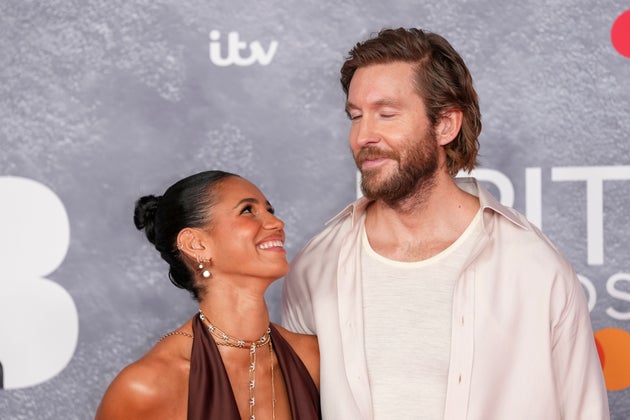 Vick Hope and Calvin Harris at the 2025 Brit Awards
