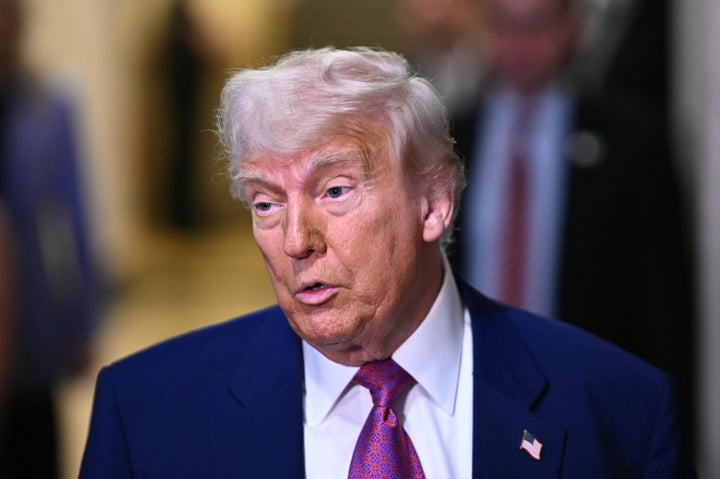 President Donald Trump speaks to reporters as he arrives for a House Republican meeting at the US Capitol in Washington, DC on May 20, 2025. (Photo by MANDEL NGAN/AFP via Getty Images)