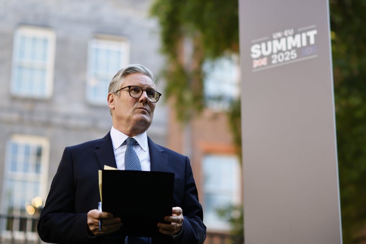 British Prime Minister Keir Starmer poses at a business reception on the sidelines of the U.K. and EU summit, at Downing Street in London, on Monday, May 19, 2025. The U.K. announced one day later that it is suspending free trade negotiations with Israel and slapping sanctions on settlers, citing the ongoing violence against Palestinians in both the occupied West Bank and in Gaza.
