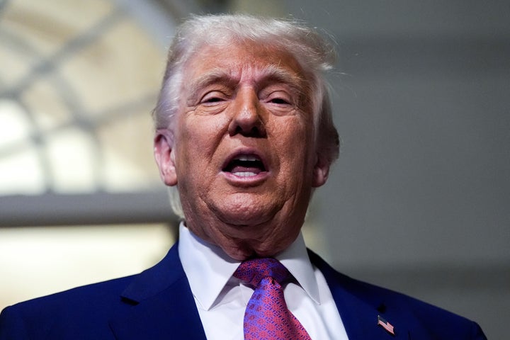 President Donald Trump speaks to reporters before a House Republican conference meeting on Tuesday at the U.S. Capitol in Washington.