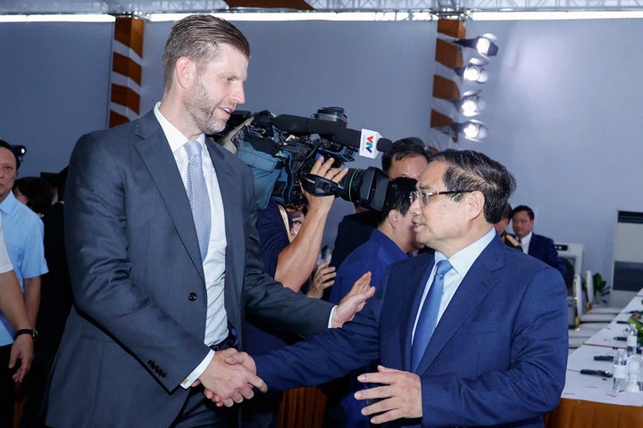Eric Trump shakes hands with Vietnam Prime Minister Pham Minh Chinh during the groundbreaking ceremony for the Trump International, Hung Yen resort and golf course project in Hung Yen province on May 21, 2025.(Photo by STR/AFP via Getty Images)