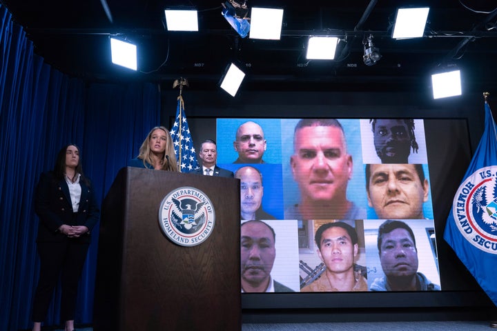 DHS Assistant Secretary for Public Affairs Tricia McLaughlin, flanked by Deputy director of U.S. Immigration and Customs Enforcement Madison Sheahan, left, and Acting director of U.S. Immigration and Customs Enforcement Todd Lyons, speaks at ICE headquarters. (AP Photo/Jose Luis Magana)